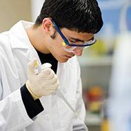 Student in a lab. 